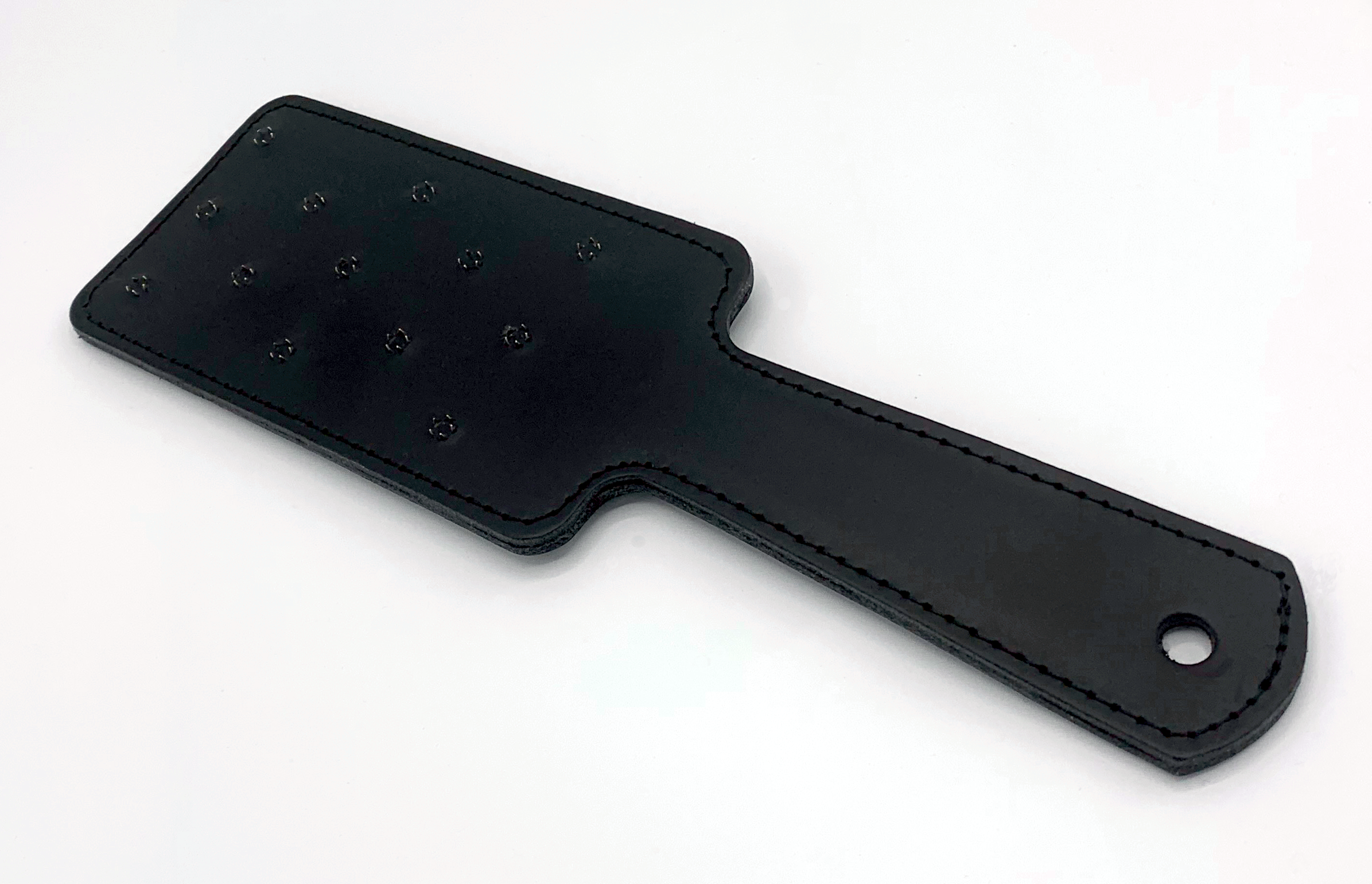 Lederpaddel mit Dornen und Federstahleinlage